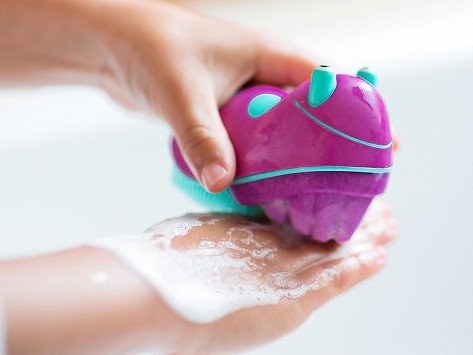 A kid's hand scrubber to make your resident Pig-Pen excited for germ-free paws.
