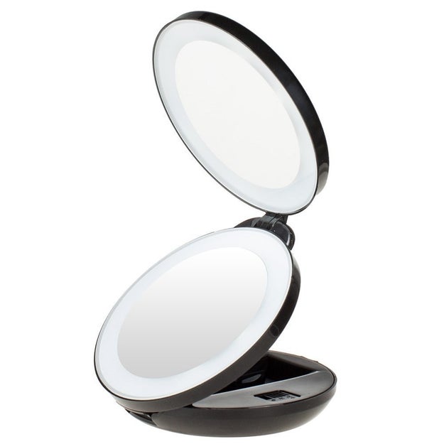 A magnifying LED makeup mirror they can tuck into a bag and use to turn a flat surface into a vanity.