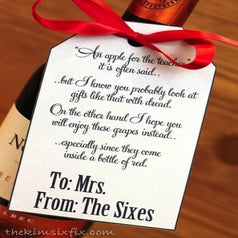 blogger's photo of gift tag on bottle of wine with a poem about gifting wine to teachers