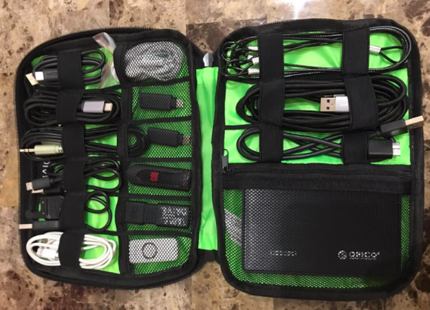 A cable organizing case to help their travels go ac-cord-ing to plan.