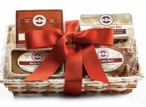 Les Trois Petits Cochons is featuring a festive holiday basket - Joyeuses Fêtes Basket! This festive basket includes sweet and savory Terrine des Trois Rois, delectable Mousse Truffee, all-natural smoked duck breast and Petits Toasts...all wrapped up in a red bow for the holiday spirit.