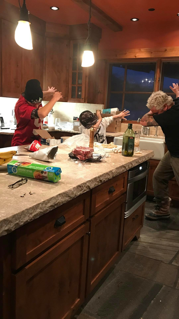 Guy Fieri dabbing with his sons.