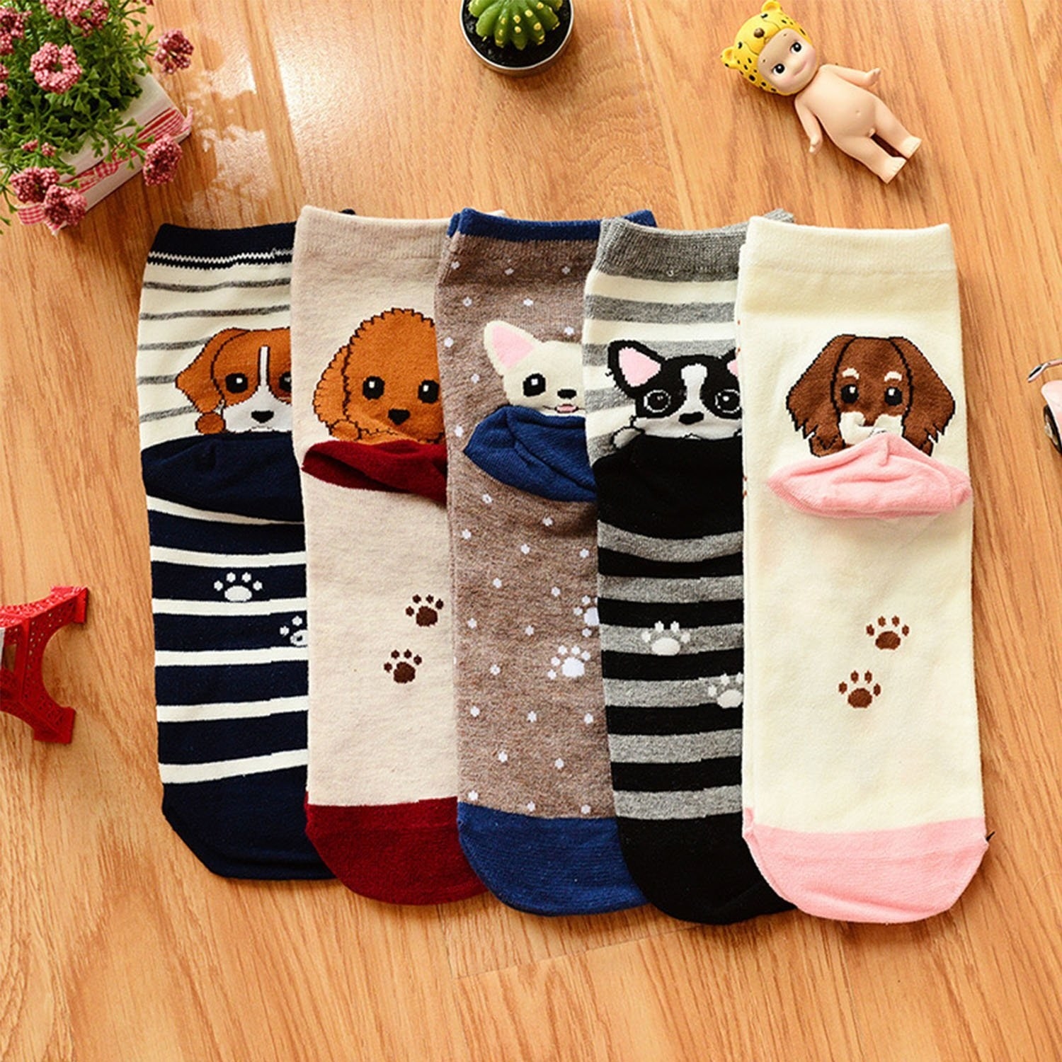 Promising review: "Adorable, fit well, holds up after washings. Other people notice these and comment. It's a great way to meet other dog-lovers. Plus I smile every time I put a pair on." —JKNOXPrice: $18.99 for five / Styles: eight