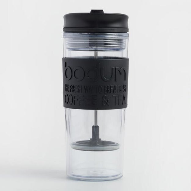 A chic double-walled travel press/mug for pipin' hot coffee or tea anywhere ya want some — talk about efficiency!