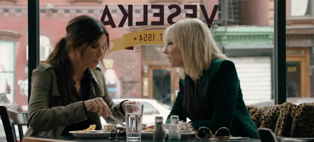 Cate and DEBBIE plot their heist at Veselka (maybe eating pierogis?)