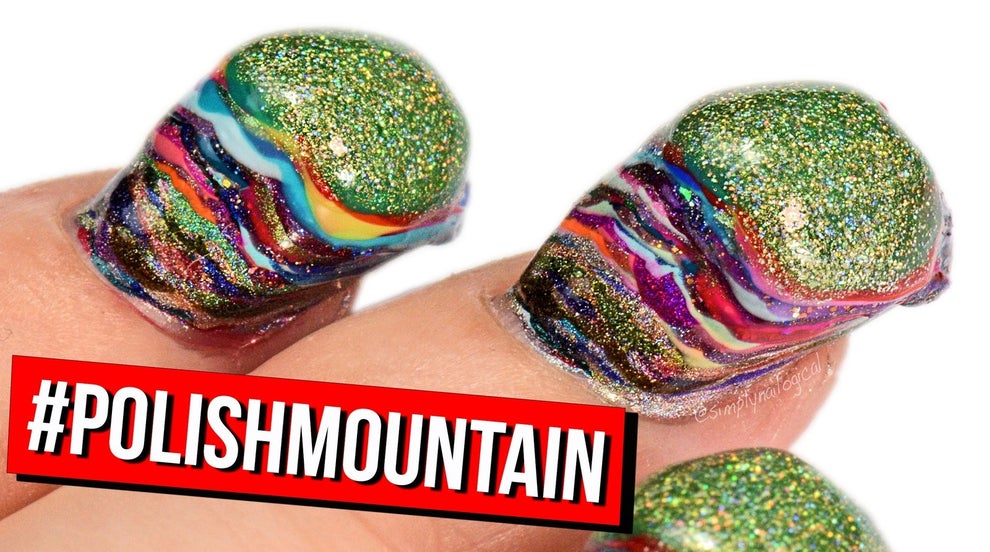 Snow Globe Nails Are A Thing Now, And They Look Weird And Cool At The