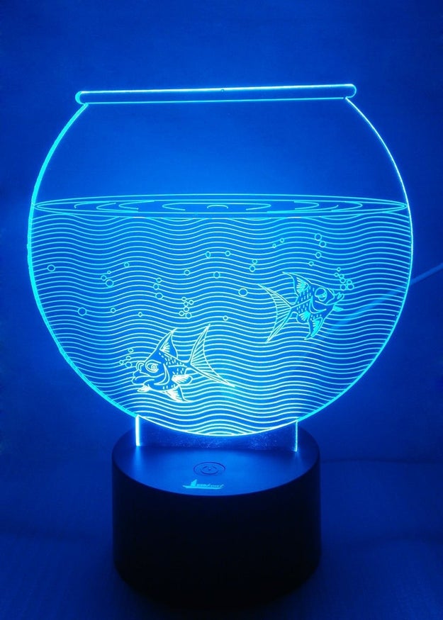 A USB-powered LED light fish tank you can set up in one of seven glowing colors.