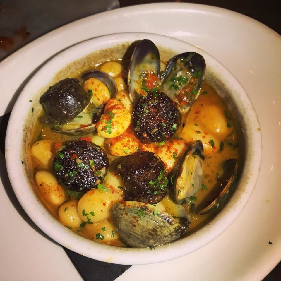 The fantastic, hearty broth flavored with clams and preserved white beans featured savory blood sausage - a perfect dish to warm your heart.