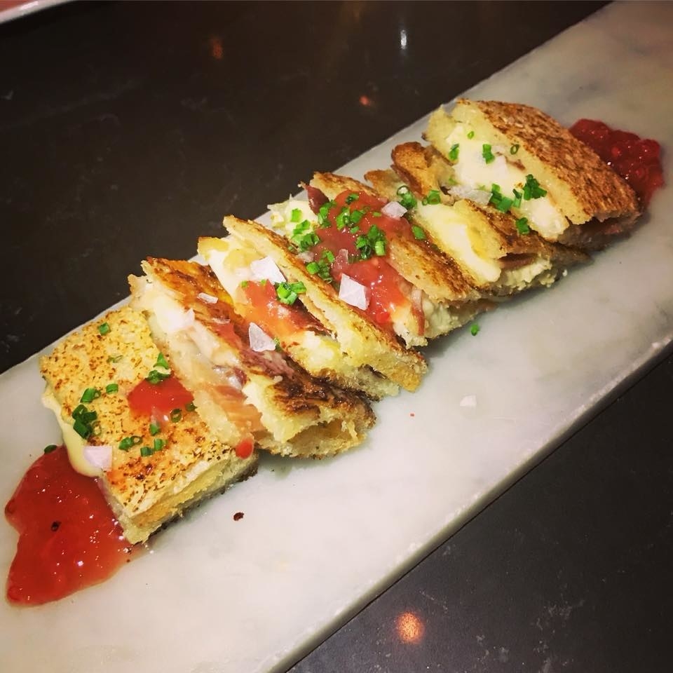 If you thought "grilled cheese" was all-American, think again. The Bikini is Spanish version of grilled cheese - in between two pieces of pullman bread are thin cured jabugo ham and leonora cheese. The crispy, pan-fried exterior of the sandwich is smothered in sweet & savory tomato marmalade.