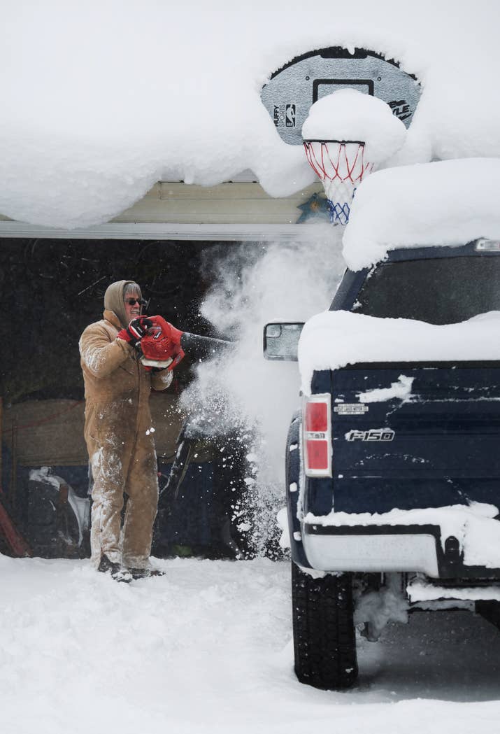 Many people in Erie were seen working to get their cars out of the snow.