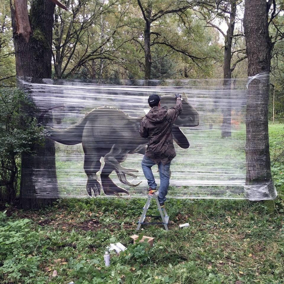 An Artist Spray-Paints Plastic Wrap In The Forest With Interesting Results