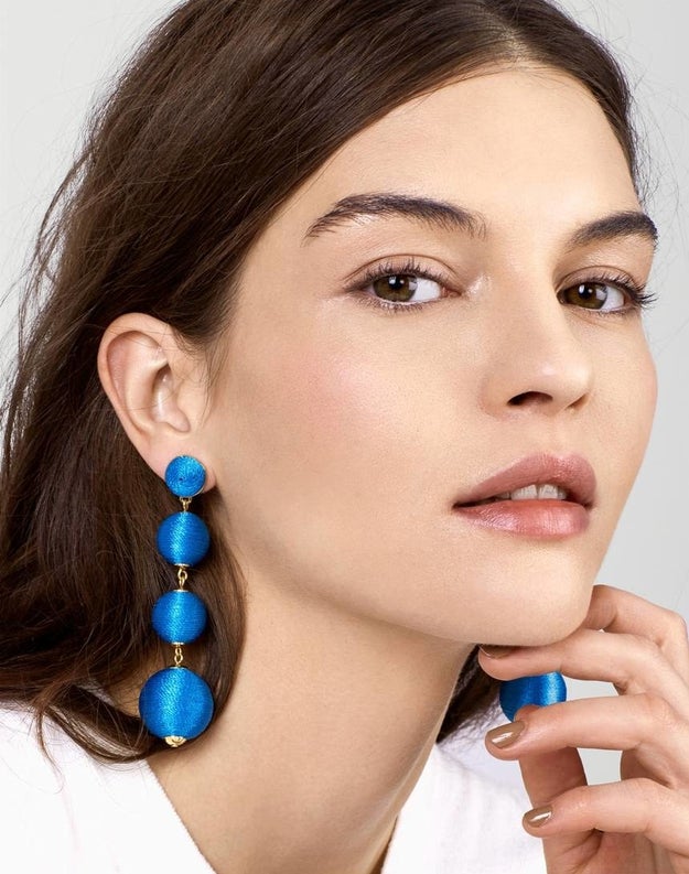 A stunning pair of shoulder-length earrings to add that pop of color a cold winter so desperately needs.