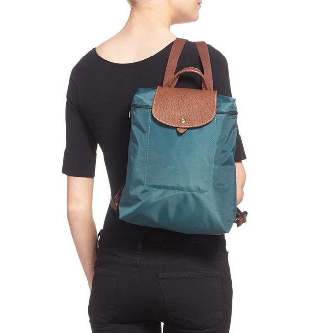 A practical AF Longchamp nylon and leather backpack to help you lug around all those things you just can't leave the house without.