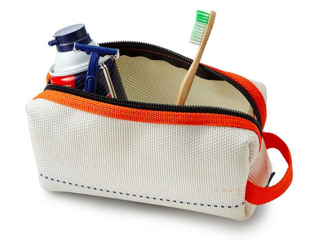 A dopp kit made from recycled fire hoses.