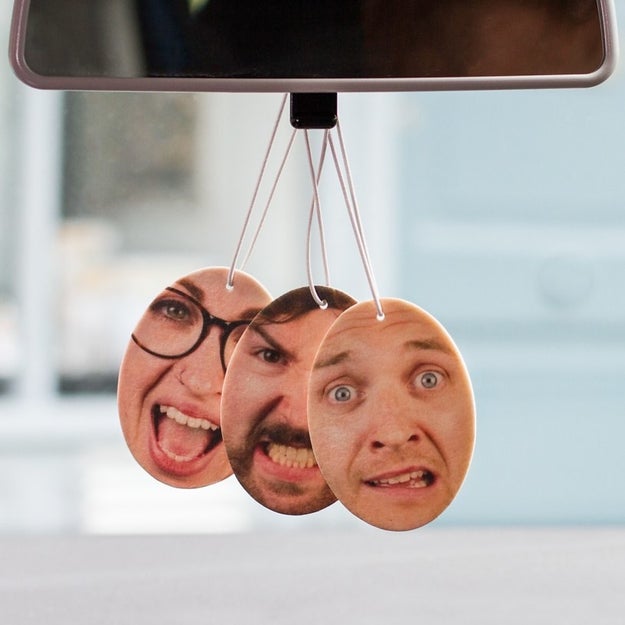 An air freshener with your face on it, so you'll always be with them.