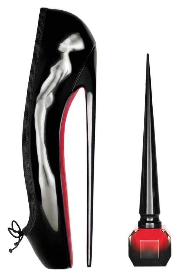 A bottle of Rouge Louboutin nail color by Christian Louboutin so you can get your nails the same shade as your red bottoms.