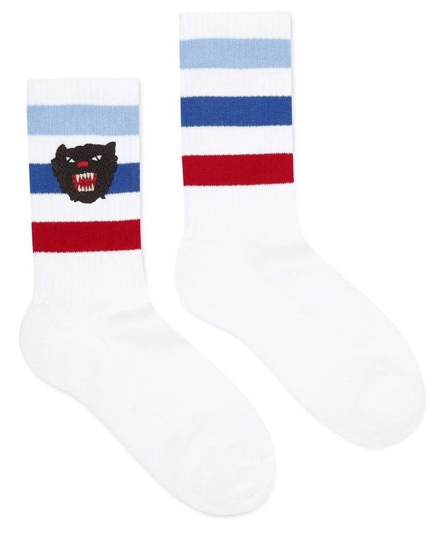 A pair of Gucci crew socks made in Italy from a stretchy cotton blend.