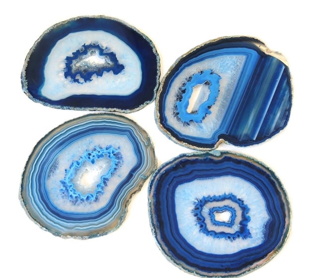 A set of agate coasters for an aesthetic that'll be ~set in stone~ as soon as they hit your coffee table.