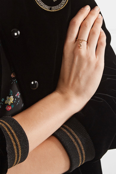 A gold-plated Saint Laurent charm ring for a delicate and discreet designer touch.
