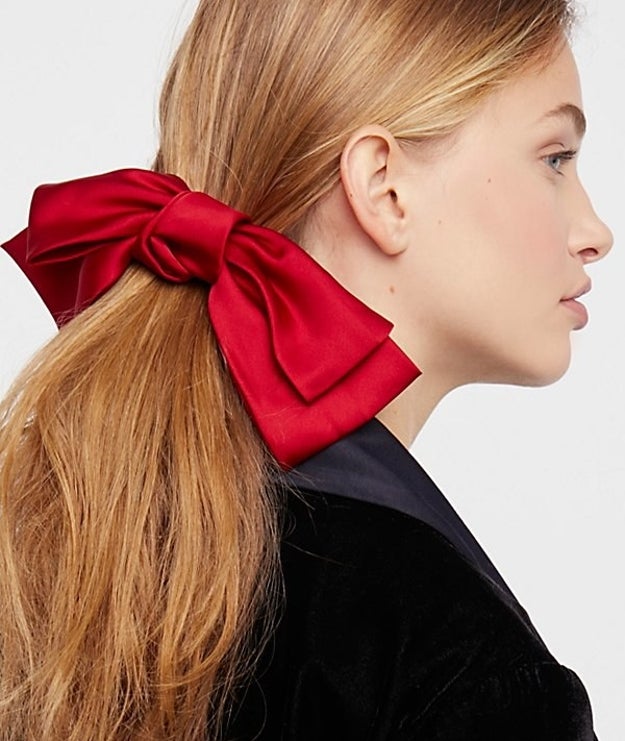 A silk bow barrette, because we all need to feel like we're somehow going to Paris without starting a GoFundMe.