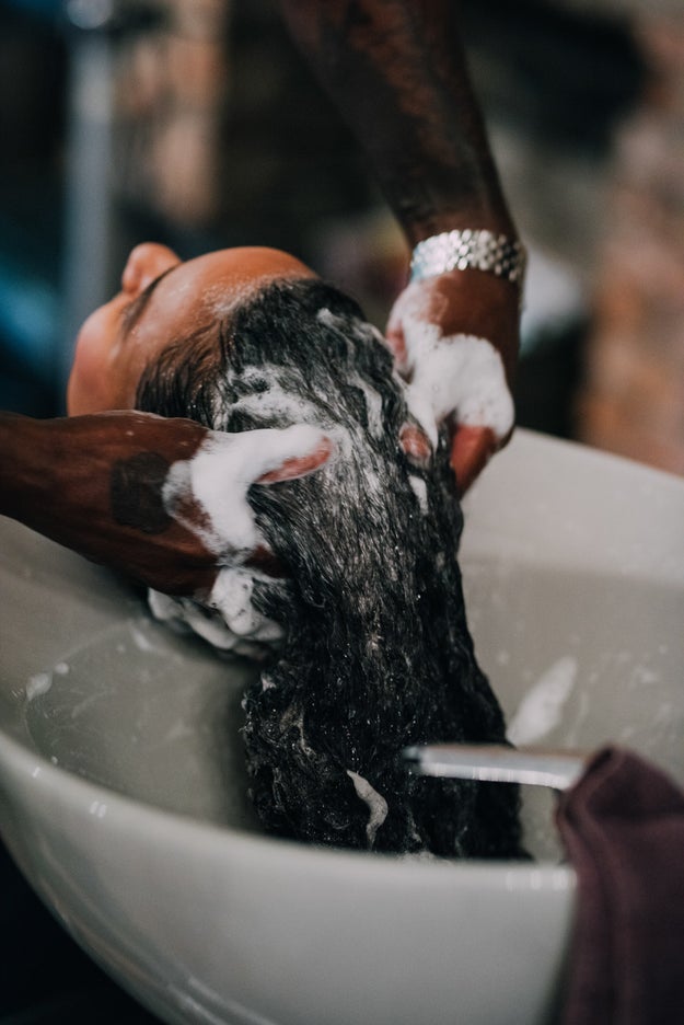 The first step to combating dryness is a thorough cleansing, which will help moisturizing products penetrate your scalp and hair. You'll know you're getting all that buildup gunk off when your shampoo starts to lather into thick, foamy suds.