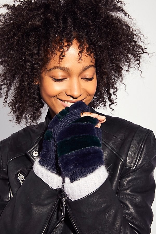 A pair of faux fur fingerless gloves, because hoes do indeed get cold and this is your bestie — you don't want her to freeze.