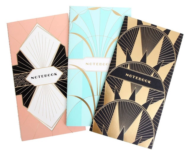 A trio of art deco notebooks, because even if we don't have Daisy's exquisite wardrobe, we can still pretend we will one day.