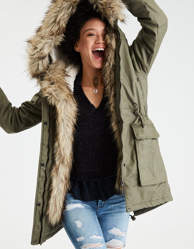 A faux-fur hooded parka with sherpa lining that says "come at me bro" to harsh winter weather.