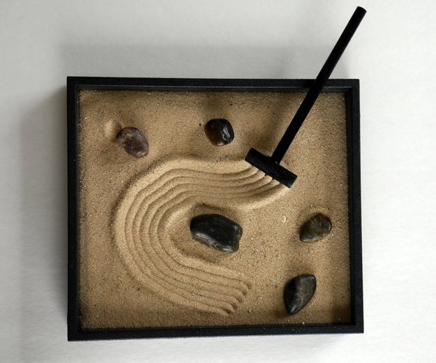 A desk-sized zen garden to keep them from going off on your manager. One of you can't lose your jobs now, you'd miss each other too much.