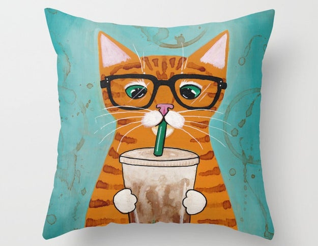 A pillow bound to put the biggest darn smile on their face, especially if they love cats.