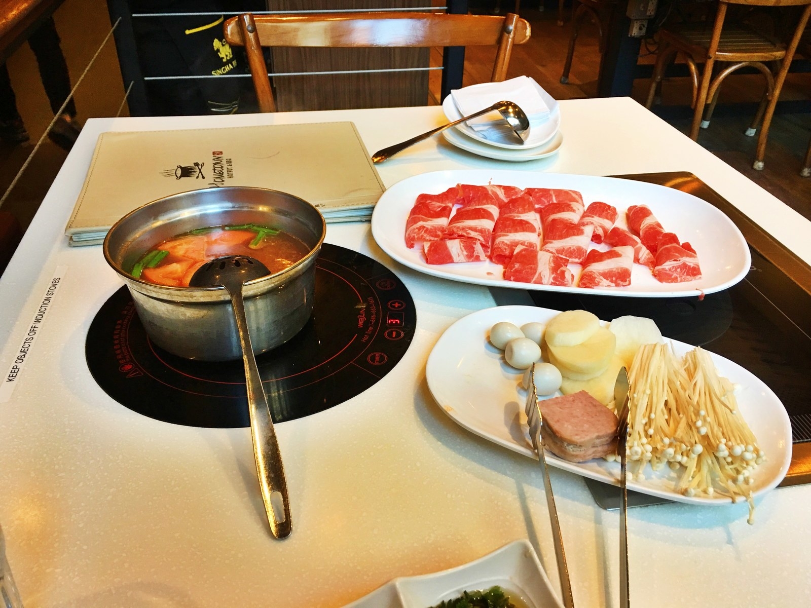 You have to venture to the border of Little Italy and Chinatown to find Hometown Hotpot, but it hosts some of the most authentic Sichuan and Chongqing style hotpot I have ever tasted in the states. Whether you like a tomato soup base or a Chongqing spicy flavor, you're sure to find your way to a full belly. They also do barbecue if that is more your thing. Extra side note, if you visit them on the day of your birthday your meal is completely free! Otherwise, you'll pay around $27.99 for all you can eat.