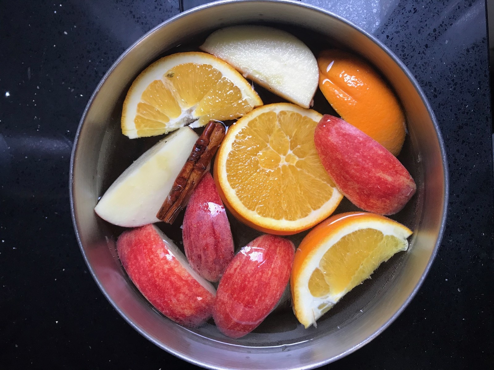 Fruit simmering a big pot