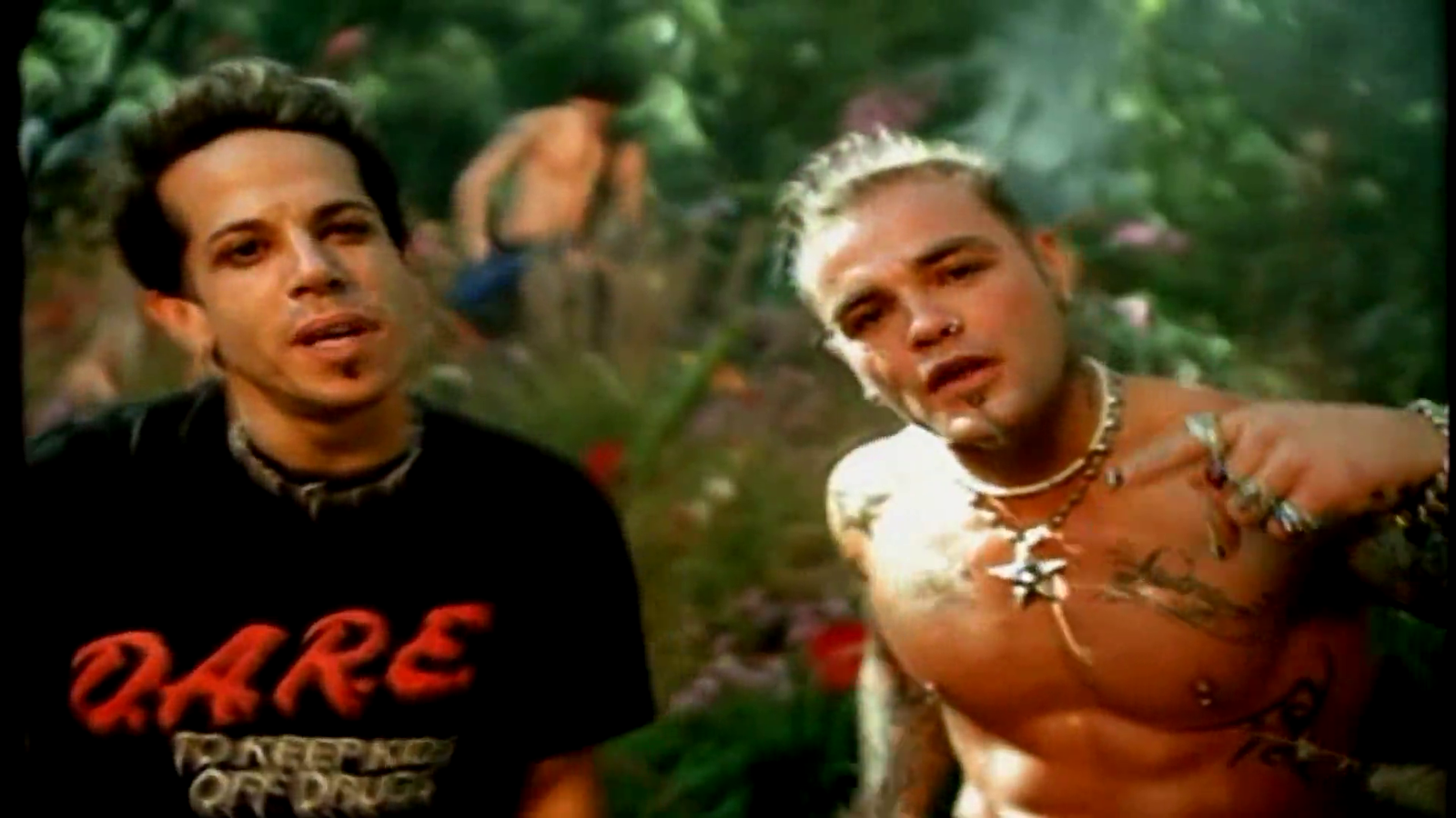 a screenshot of the boys in a field from the video