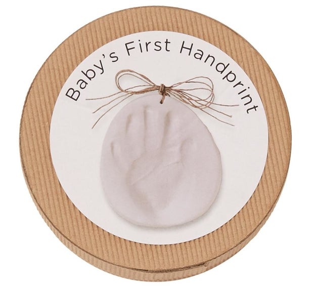 A baby handprint kit complete with no-mess, air-dry clay and hanging twine to give to new parents.