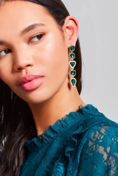 A pair of drop gem earrings — they just may make strangers assume their towering, well-dressed bae is the bodyguard they hired to keep these danglers safe for the night.