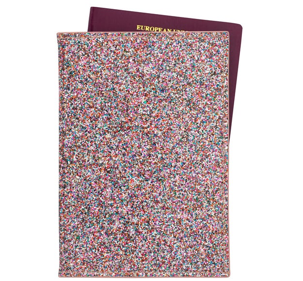 A glittery passport cover that a wanderluster should get good use out of, plus they won't have a hard time finding it in the depths of their carry-on bag.