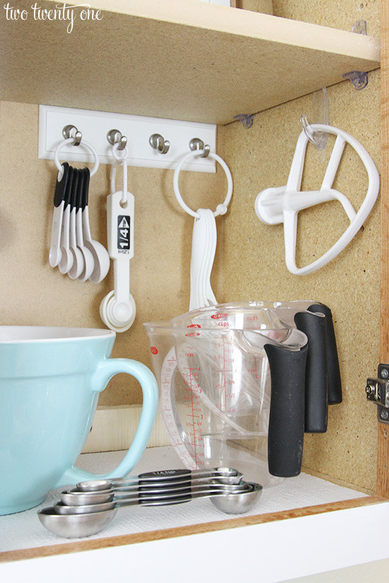 Maybe you want to show off your baking cabinet, with everything you need neatly hung on Command Hooks.