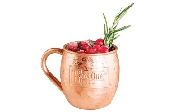 Crafted by Ketel One Family Made Vodka What You Need:15 oz Ketel One Vodka5 oz Lime JuiceGinger BeerCranberries and rosemary for garnishHow To Make It: Combine the vodka and lime juice in a carafe filled with ice. Add ginger beer to fill and stir lightly. Serve in a copper mug and garnish with cranberries and rosemary.