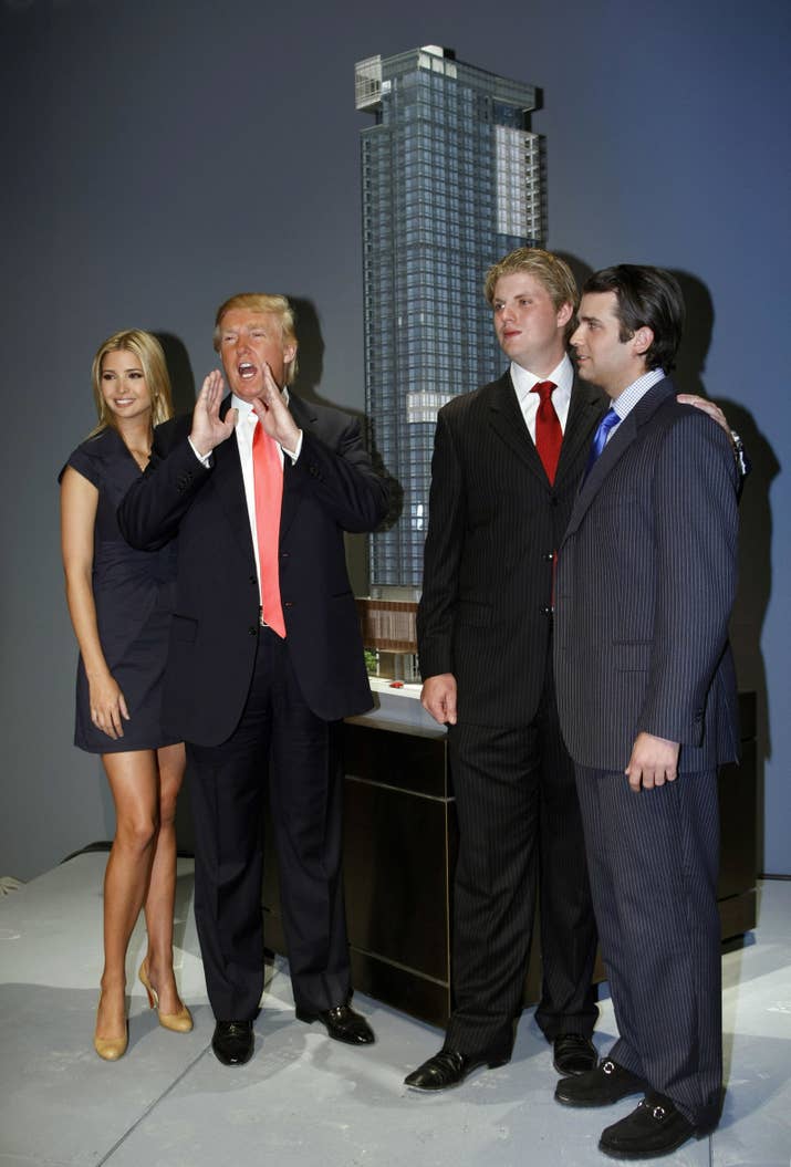 From left to right: Ivanka Trump, Donald Trump, Eric Trump, and Donald Trump Jr. pose for photos after a press conference, where their father Donald Trump announced the launch of Trump SoHo Hotel Condominium in New York in September 2007.