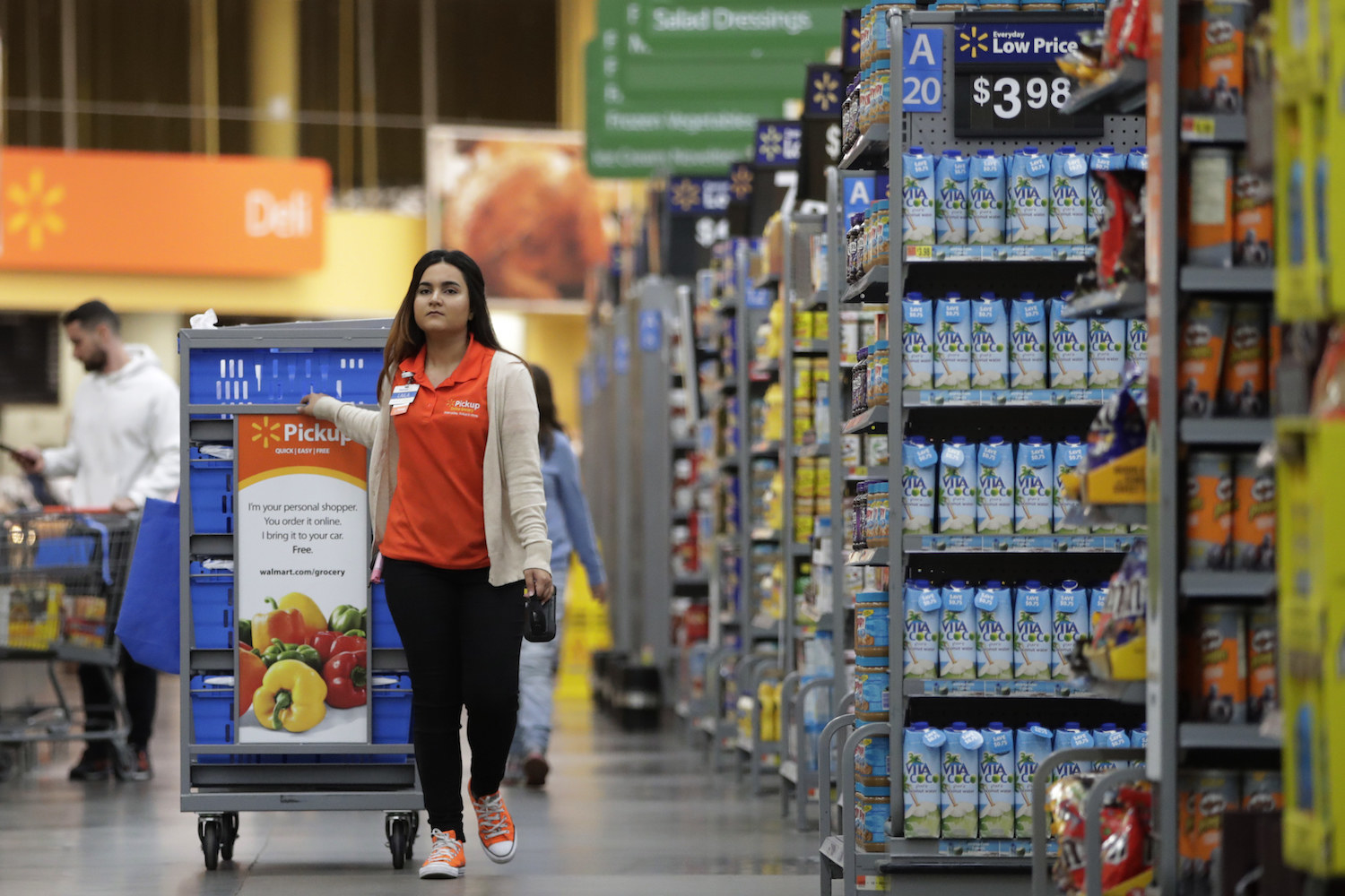 Walmart Tries To Boost Its Reputation With New Wage Hikes And Paid