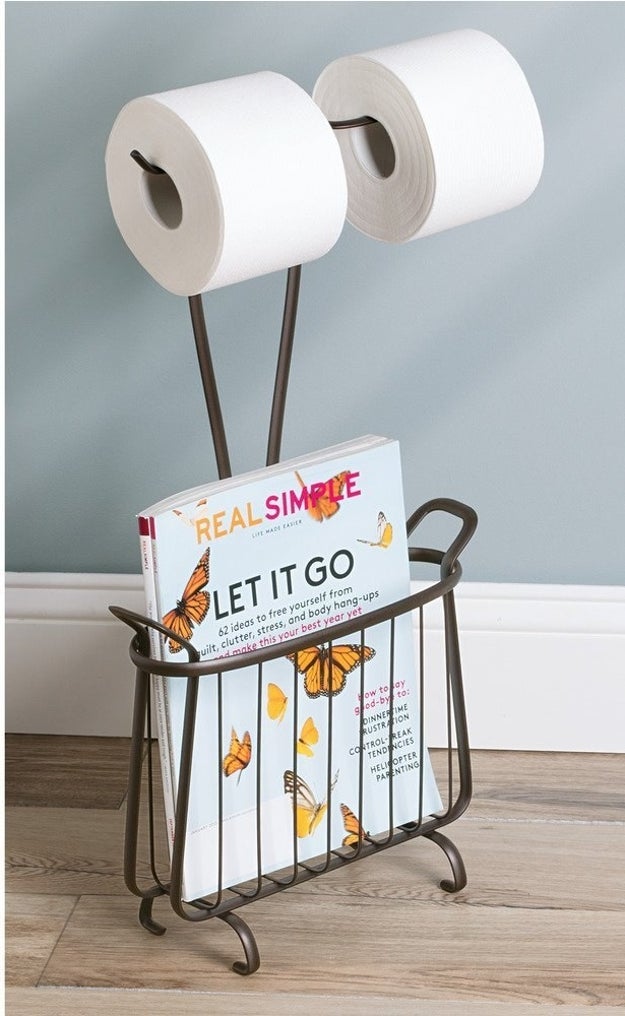 Provide an extra roll and some reading material for guests (and yourself) with a TP stand.