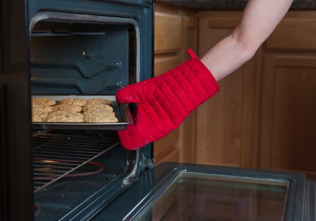 Never take something out of the oven using a wet towel or mitt.