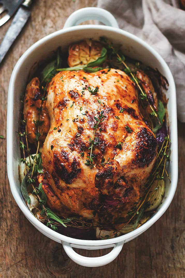 Mayonnaise makes the perfect rub because the fat helps the skin crisp up and it's thick enough so you won't have to baste or reapply it (unlike melted butter or oil). Learn how to do it here.