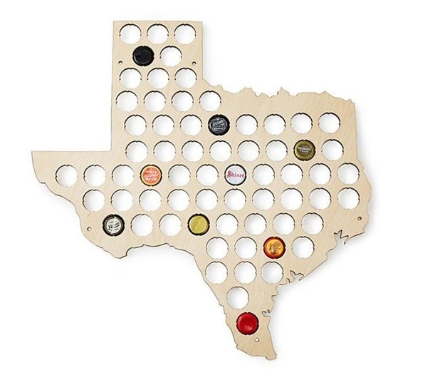 This state-shaped display board cut from birch plywood to show off your cap collection.