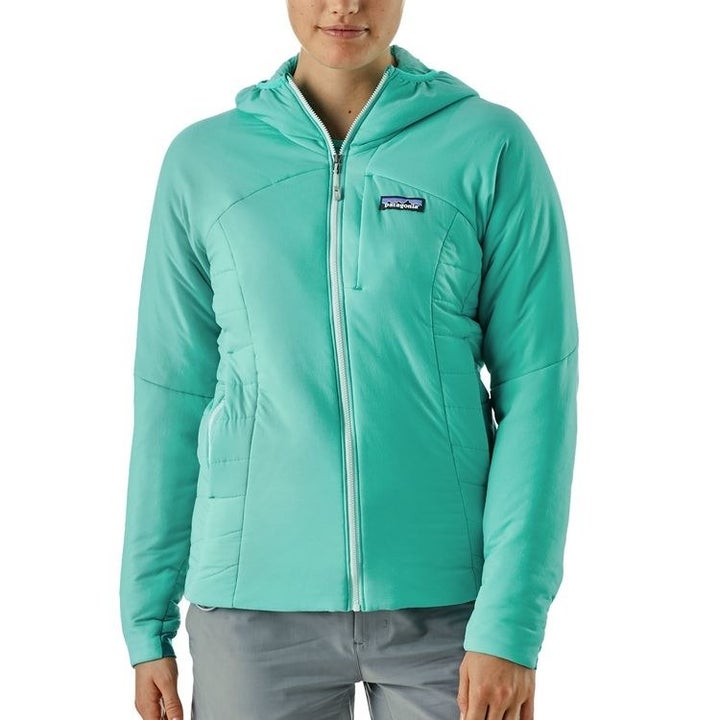 model wearing a blue light jacket