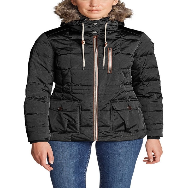 model wearing black puffer coat 
