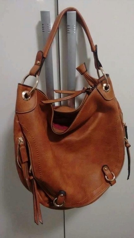 This purse is really happy to see you.