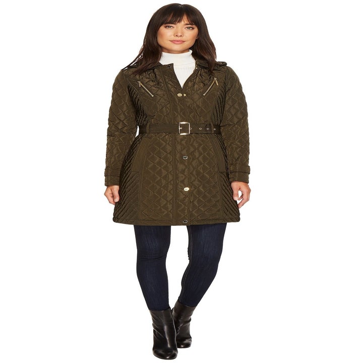 model wearing olive green trench coat