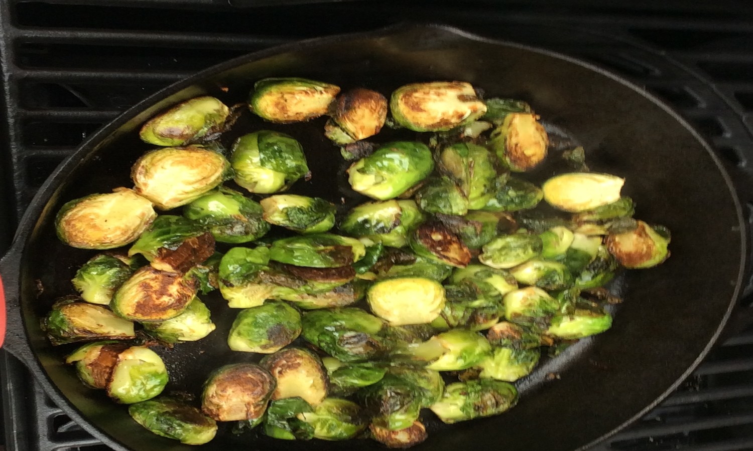 A favorite of the cabbage family, Brussels sprouts came to the United States via French immigration in the 18th century. They are dominantly grown in California and available June thru January making them a Fall and holiday menu favorite. SmokinLicious® will take the flavors up a notch and add wood smoke into Brussels sprouts for two upcoming recipes. We’ll do this on the gas grill fit with wild cherry wood chunks to bring subtle smokiness to the finish sprouts. First purchase 3 lbs. of Brussels sprouts and get two cherry single filet chunks, and you’re ready to fire up the grill and get smoking.THE EASY GRILL METHODBringing the flavor of wood smoke into Brussels sprouts is so easy. To start, gather about 3 lbs. of Brussels sprouts, some cooking oil, butter, and a heavy-duty skillet. I prefer a nut oil like walnut or almond. For a skillet I’ll be using cast iron. I’ve trimmed the ends on about half the sprouts and for the other half, I’ve trimmed the ends and cut them in half. That’s it! Fire up the grill and get ready for a quick method of adding great wood-fired flavor.It only takes a couple of pieces of wood chunk to bring fabulous flavor to the grill. I set up a cast iron pan on one side and place two cherry wood chunks on the heat shields of the far burner. Let the pan heat up for about 5 minutes then pour in a couple of tablespoons of oil and heat. Right before I add the Brussels sprouts, I add a couple of tablespoons of butter. In go the whole Brussels sprouts and the lid comes down. Leave untouched for about 5 minutes before turning.FLAVOR FINISHAs I have two recipes in mind I’m cooking two batches of Brussels sprouts: one batch whole and one batch halved. After leaving for 5 minutes, I stir them to ensure that all surfaces are infused with wood flavor. I maintain a temperature of 350-375° F which will make this a quick cooking method. The first 5 minutes, the lid is down but once stirred, you can finish the cooking with lid up. Remember, cast iron will retain heat, so you can turn the heat off and let sit for about 5 minutes.After stirring a couple of times, both the whole and halved Brussels sprouts are ready in about 20 minutes time. I simply remove them from the heat and bring them in to be added to my favorite recipes.I have two recipes I’ll be working on: Smoky Brussels Sprout Gratin and Tortellini with Lemon and Smoked Brussels Sprouts. These truly are the most flavorful Brussels sprouts! For those of you thinking about a holiday meal with them, well, the grill will give you that extra oven room you need. Take advantage of the long harvest season and try these mini cabbages on your grill. Check in for our recipes soon so we can get you started on how to use your prized sprouts.By Donna J. Grant, M.S., Lead Wood Specialist, Member- American and Canadian Culinary Federations, at SMOKINLICIOUS® GOURMET WOOD PRODUCTS. For additional information regarding this article or other wood cooking questions, please contact her at 1–800–941–5054 or at info@smokinlicious.com. Follow us on Quora for our content contributions.