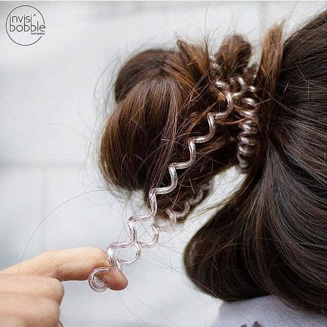 Promising review: "I’ll never wear any other ponytail holder from now on! These work so well! My hair doesn’t break and I’m constantly wearing it in a bun. I was surprised how well these worked and held my hair tightly in place. The best part is that after a day they shrink back to the size they originally started as." —SarahSee our review here (#1).Get a pack of three from Amazon for $7.49 (see more colors here).